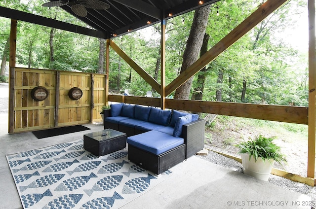 view of patio with an outdoor hangout area and a ceiling fan