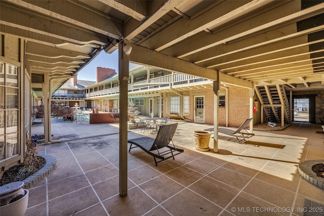 view of patio / terrace with stairs