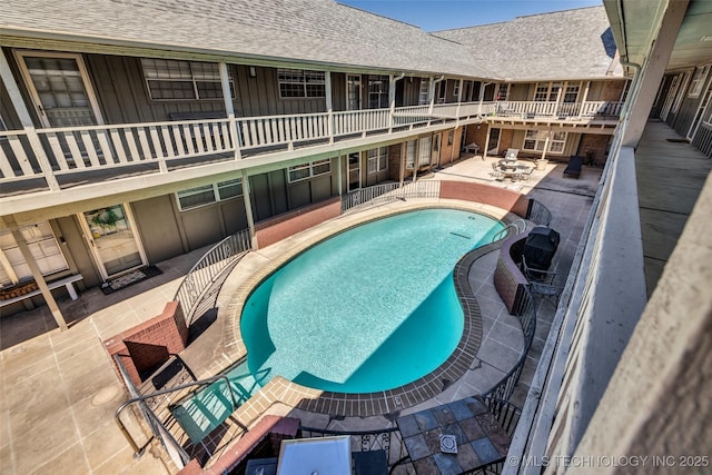 pool with a patio area