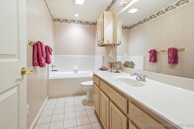 full bathroom with a textured ceiling, tile patterned flooring, toilet, vanity, and a bath