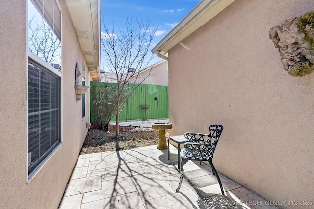 view of patio / terrace with fence