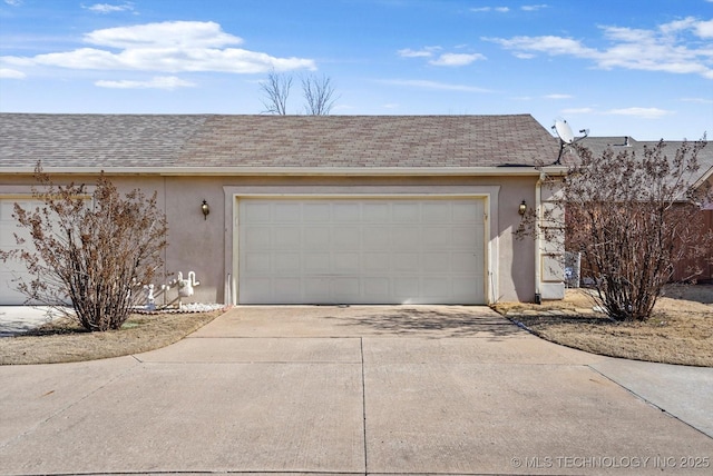 garage with driveway