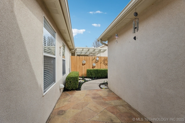 view of patio with fence