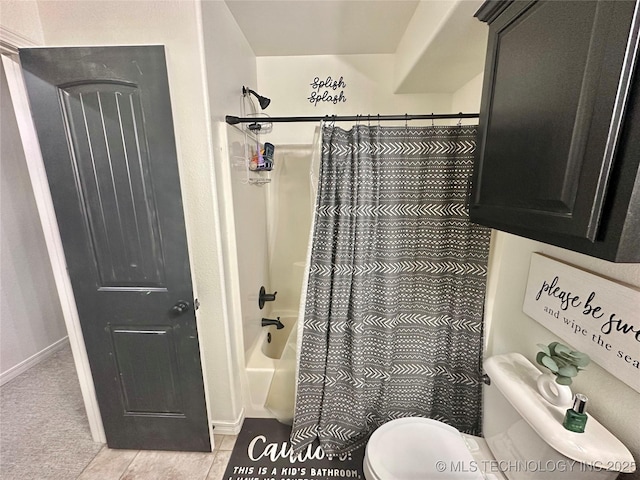 full bath with shower / tub combo, toilet, and tile patterned floors