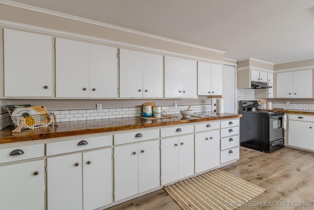 kitchen featuring white cabinets, decorative backsplash, light wood-style flooring, under cabinet range hood, and black range with electric cooktop