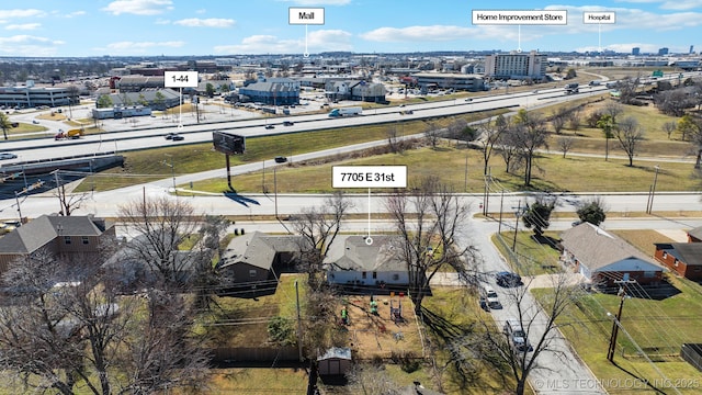 birds eye view of property featuring a view of city