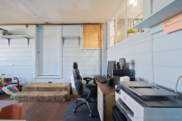 office area featuring a textured ceiling and wood finished floors