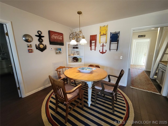 dining area with baseboards and dark wood-type flooring