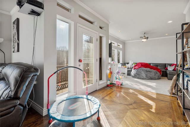 interior space featuring ceiling fan, ornamental molding, and recessed lighting