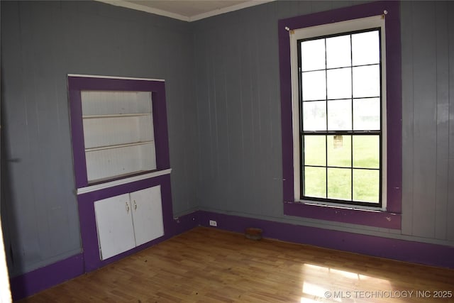 unfurnished room featuring wood finished floors