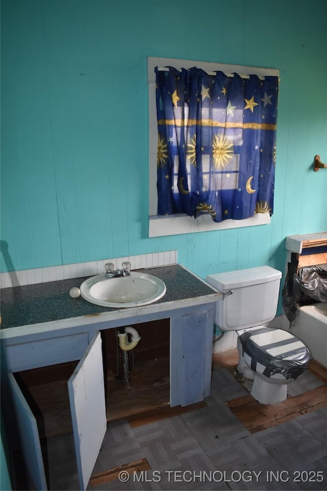 bathroom with vanity and toilet