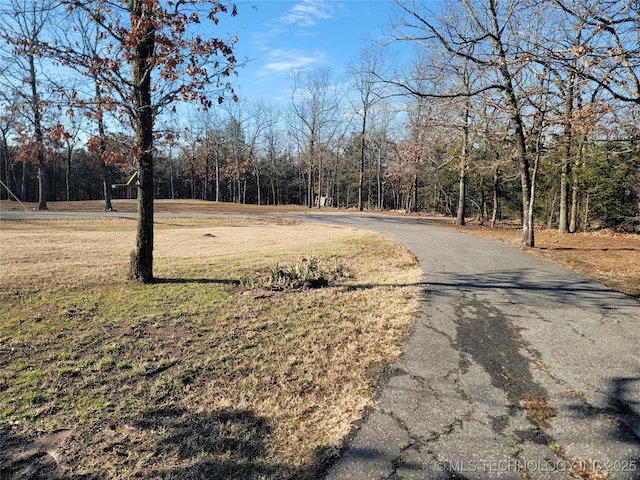 view of street featuring a view of trees