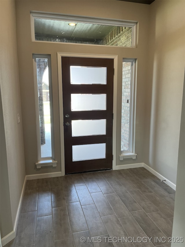 entrance foyer with baseboards