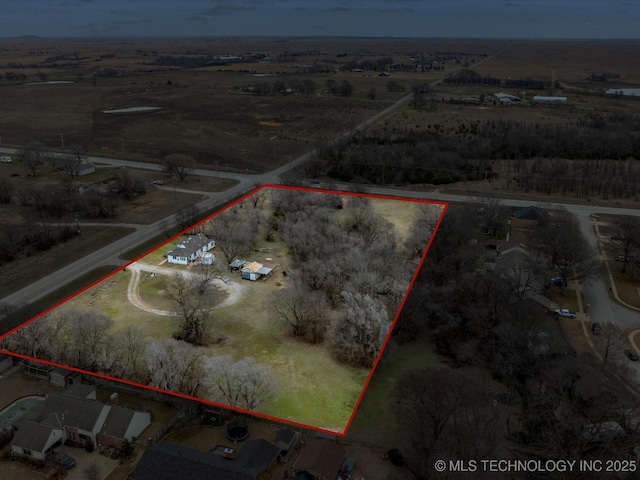 drone / aerial view with a rural view