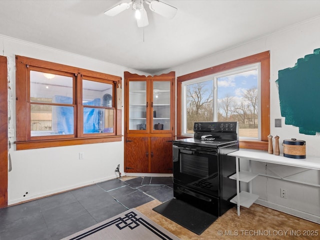 office area with ornamental molding, a ceiling fan, and baseboards