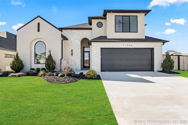 view of front of property with stucco siding, an attached garage, stone siding, driveway, and a front lawn