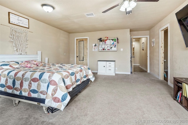 bedroom with carpet floors, ceiling fan, visible vents, and baseboards