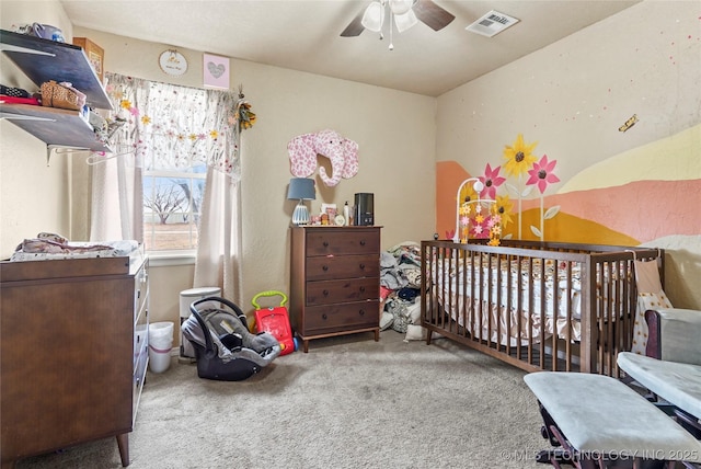 bedroom featuring a ceiling fan, carpet, and visible vents