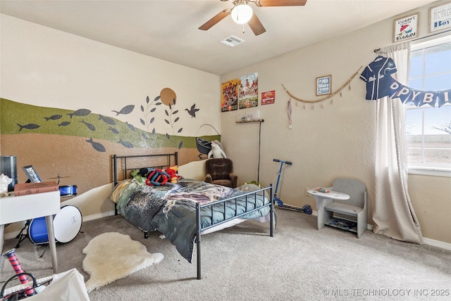 bedroom featuring carpet floors, ceiling fan, visible vents, and baseboards