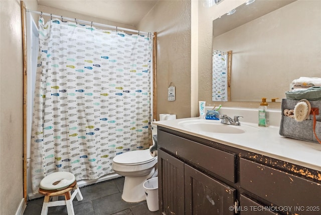 full bath featuring a shower with shower curtain, vanity, toilet, and tile patterned floors