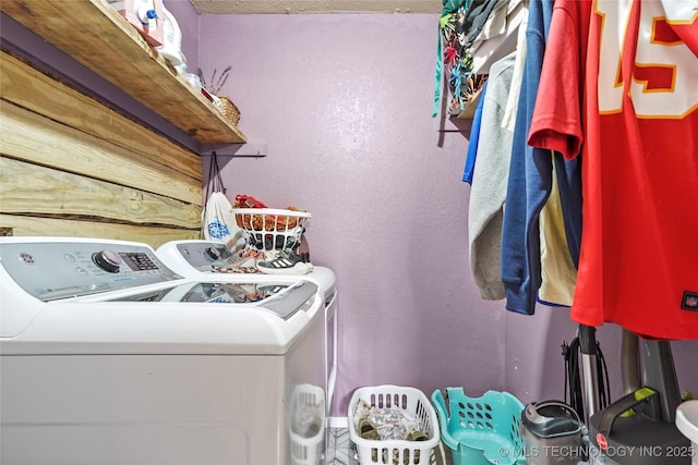 laundry room featuring laundry area and washing machine and clothes dryer