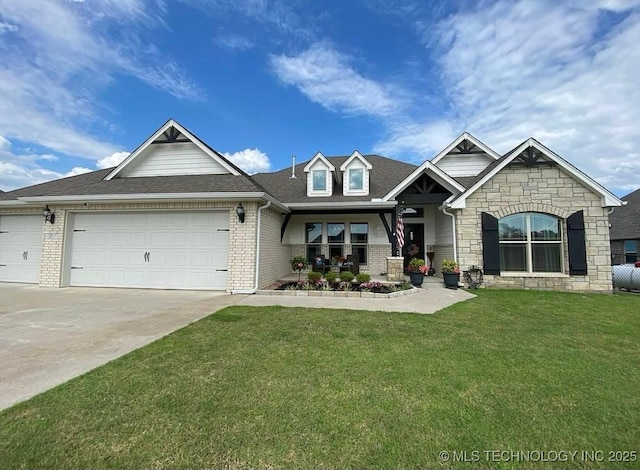 view of front of home featuring brick siding, a shingled roof, an attached garage, a front yard, and driveway