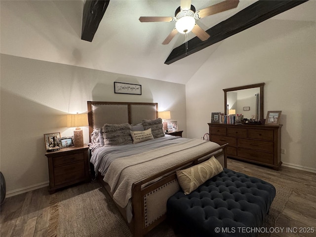 bedroom with vaulted ceiling with beams, baseboards, and wood finished floors