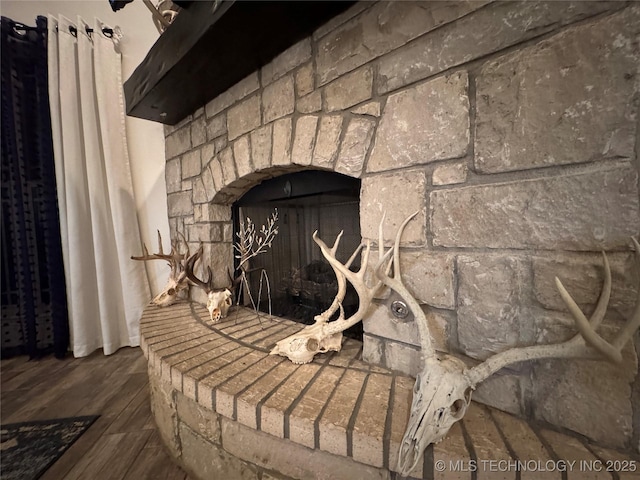 details featuring wood finished floors