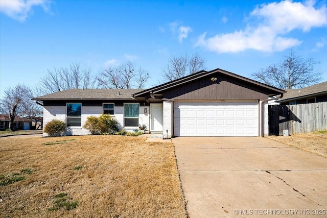 ranch-style house with an attached garage, brick siding, fence, driveway, and a front lawn