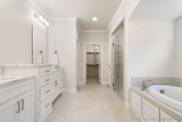 full bathroom featuring a garden tub, a walk in closet, crown molding, vanity, and a shower stall