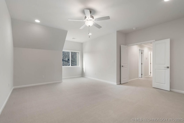 unfurnished bedroom featuring ceiling fan, recessed lighting, light colored carpet, and baseboards