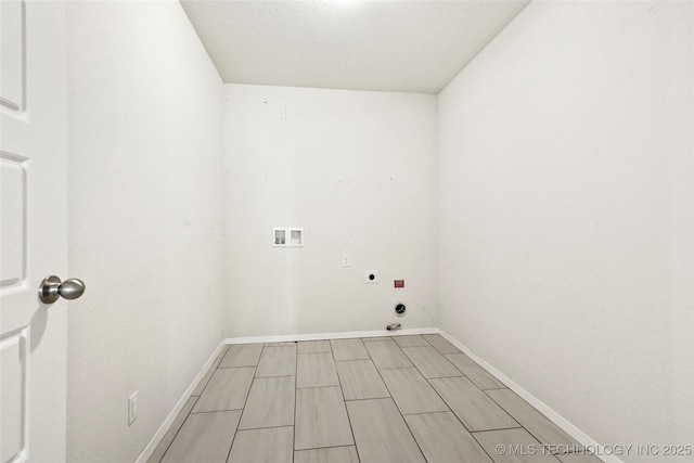 washroom featuring hookup for a washing machine, hookup for a gas dryer, hookup for an electric dryer, laundry area, and baseboards