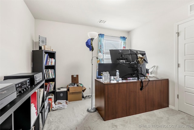 office featuring light carpet and visible vents