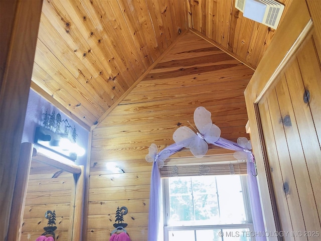 interior details with wood walls, wooden ceiling, and visible vents