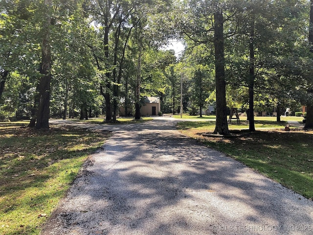 view of road featuring aphalt driveway