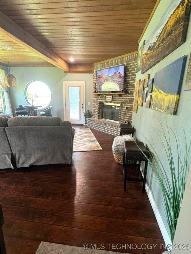 17 Tabernacle Dr, Calera, OK 74730 - living area with wooden ceiling, a brick fireplace, and wood-type flooring