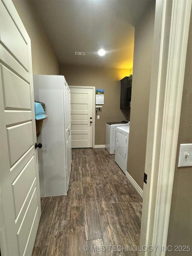 17 Tabernacle Dr, Calera, OK 74730 - laundry room with washer and clothes dryer, cabinet space, visible vents, dark wood finished floors, and baseboards