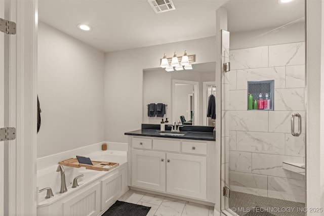 bathroom with marble finish floor, visible vents, a shower stall, and a bath