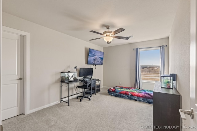 bedroom featuring carpet floors, a ceiling fan, visible vents, and baseboards