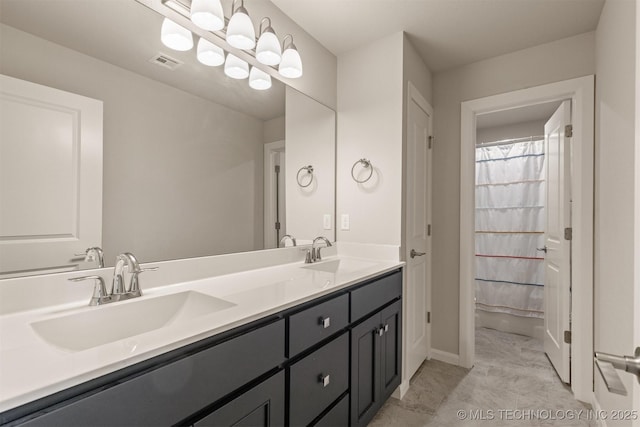 full bath with a shower with curtain, visible vents, a sink, and double vanity