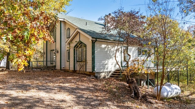 exterior space featuring a chimney