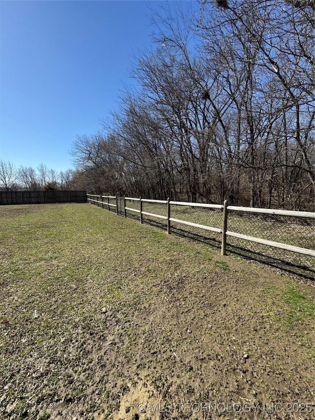 view of yard featuring fence