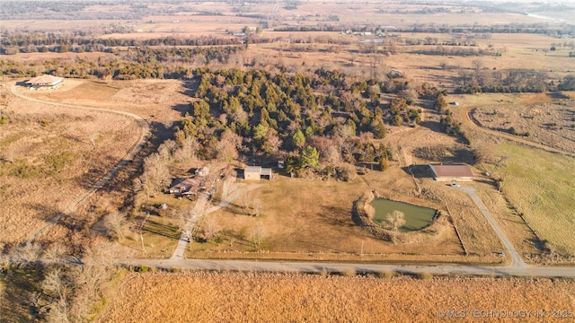 birds eye view of property featuring a rural view