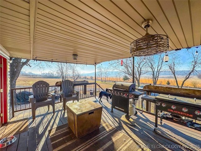 wooden terrace with grilling area