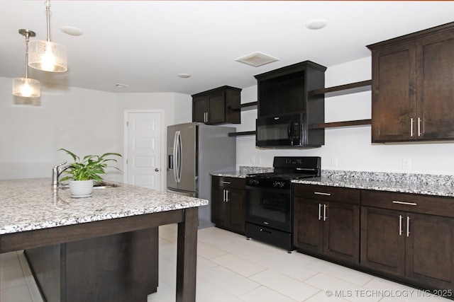 kitchen featuring dark brown cabinetry, decorative light fixtures, light stone countertops, black appliances, and open shelves