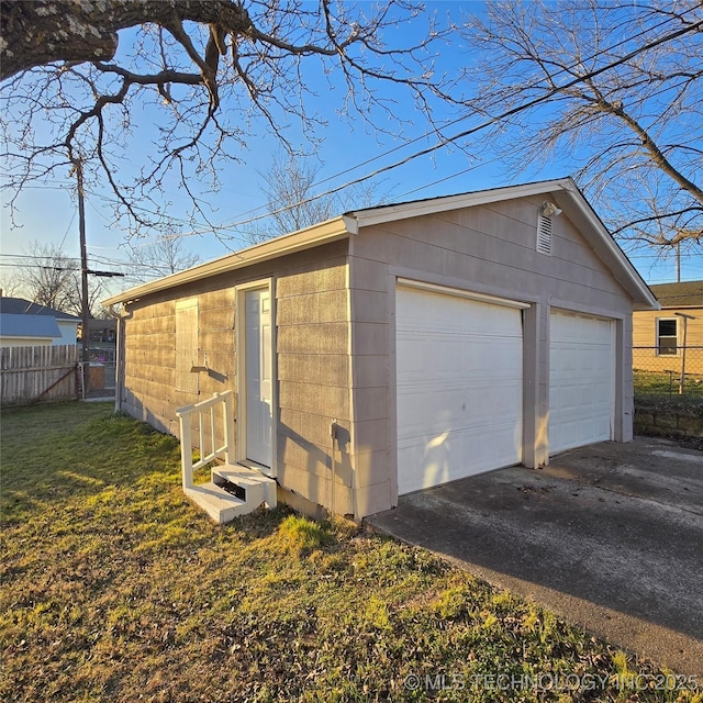 detached garage with fence