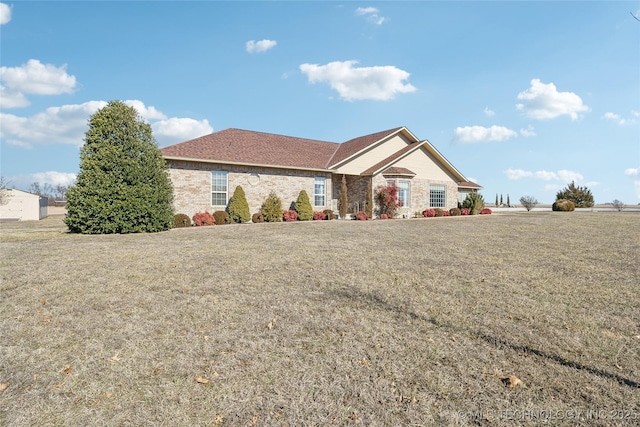 63320 E 293rd Rd, Grove, OK 74344 - ranch-style house with a front lawn and stone siding