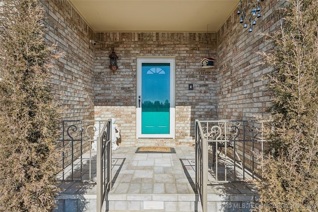63320 E 293rd Rd, Grove, OK 74344 - view of exterior entry featuring brick siding
