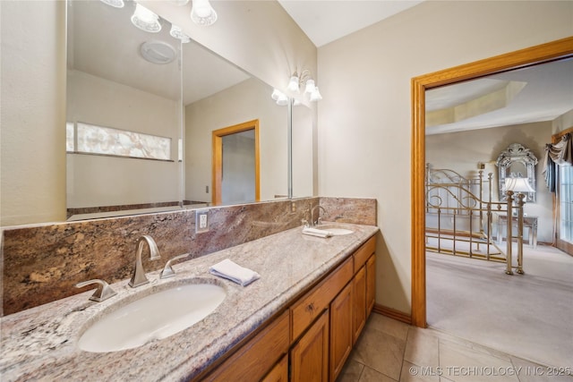 63320 E 293rd Rd, Grove, OK 74344 - bathroom with double vanity, a sink, decorative backsplash, and baseboards