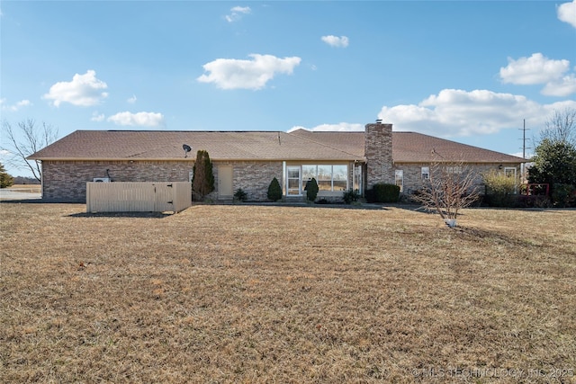 63320 E 293rd Rd, Grove, OK 74344 - rear view of property with a yard and a chimney